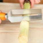 Knife slicing and cleaning cane and pineapple - Image 6